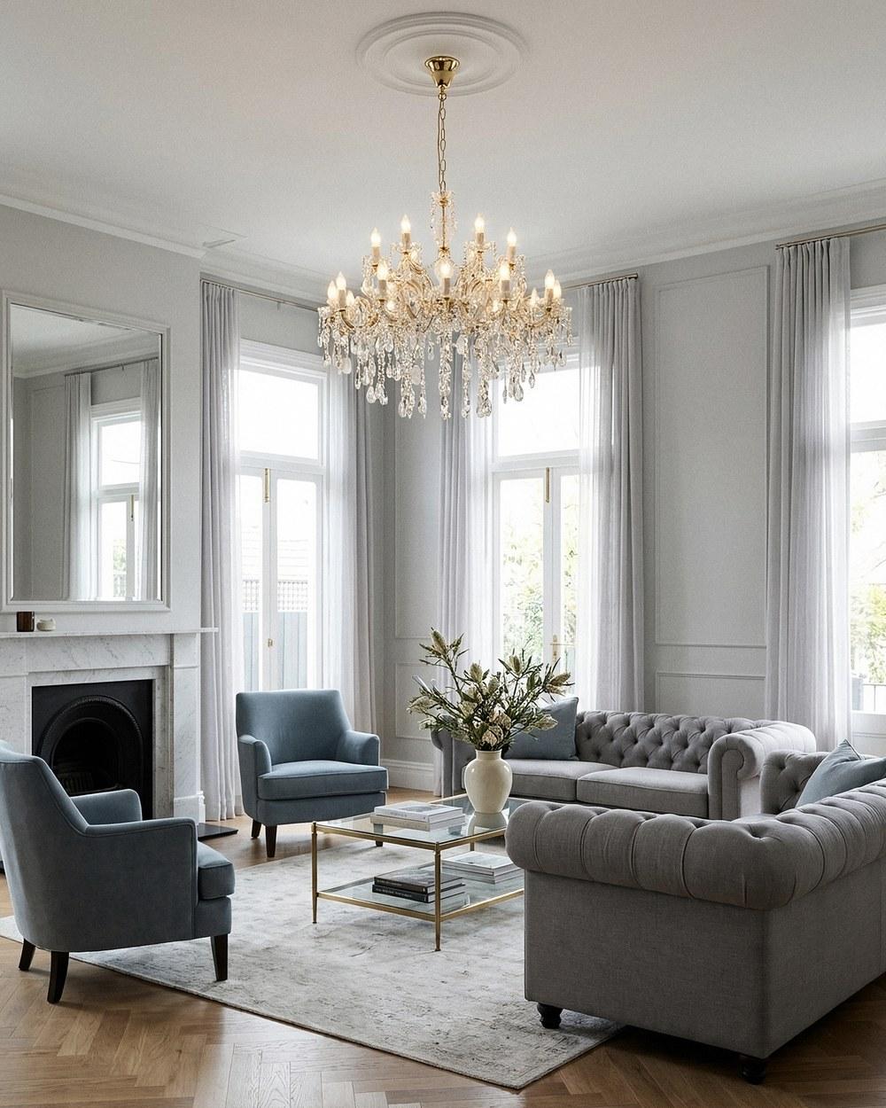 Zurich crystal glass chandelier in gold with candle globes, in an airy living room